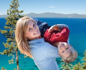 Woman holding son in 